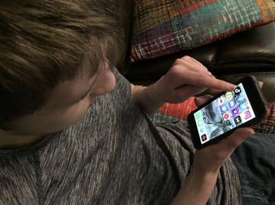 TCS: Kid uses apps on phone TikTok